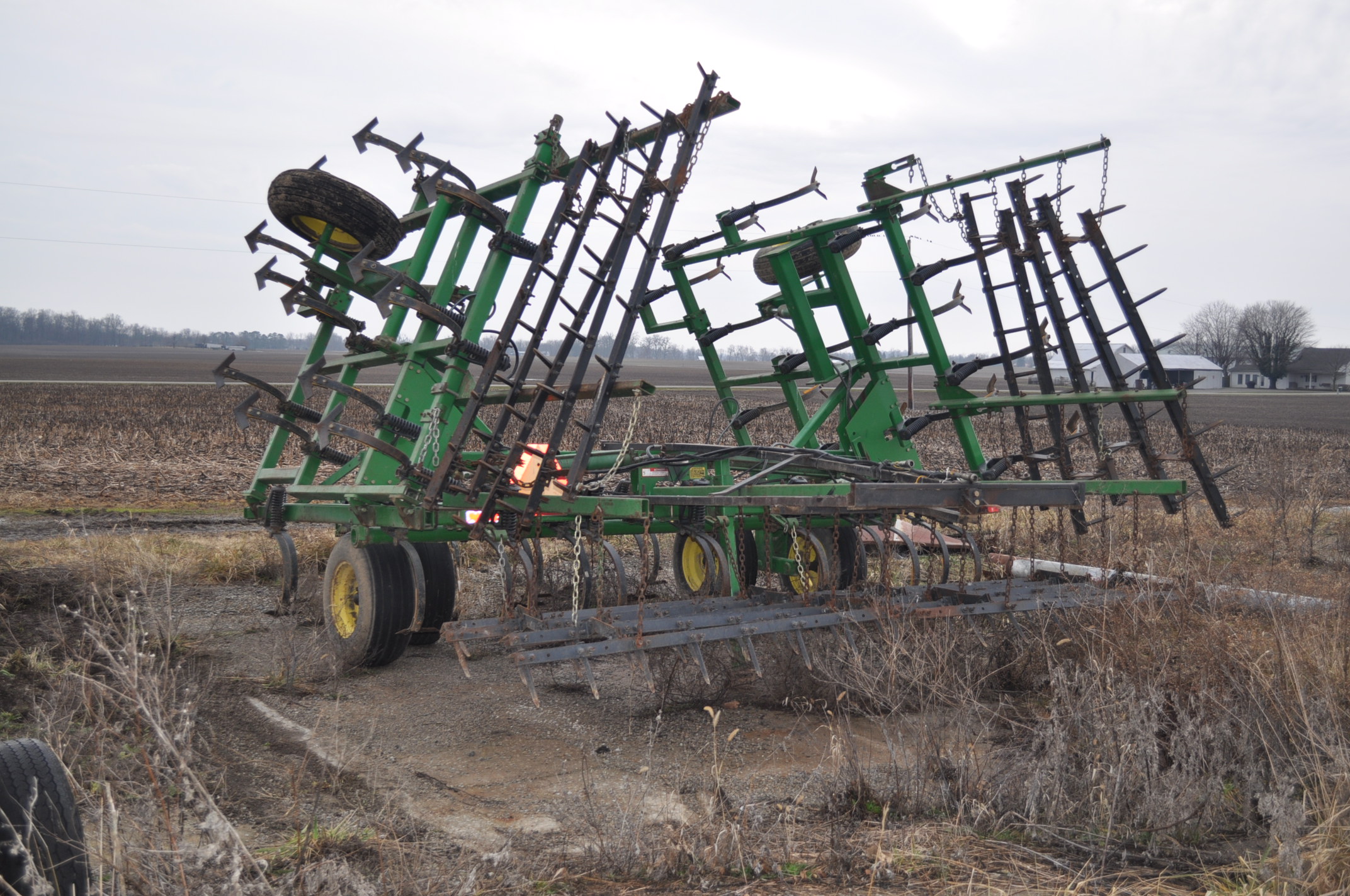 25' John Deere Field cultivator, spring shank, new sweeps, poly shank