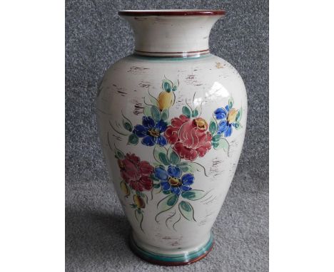 A vintage German ceramic vase with hand painted floral design. Stamled 47340, Germany to the base.H.42cm 