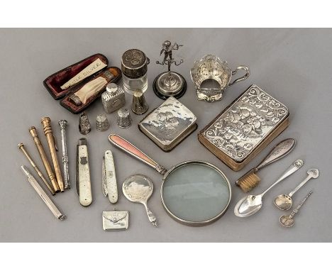 A mixed parcel of assorted small silver and white metal, to include a wrythen miniature scent bottle, a cherub ring stand, a 