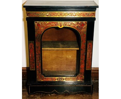 A 19th century gilt metal mounted ebonised boulle work pier cabinet, with single glazed door enclosing interior fitted shelf,