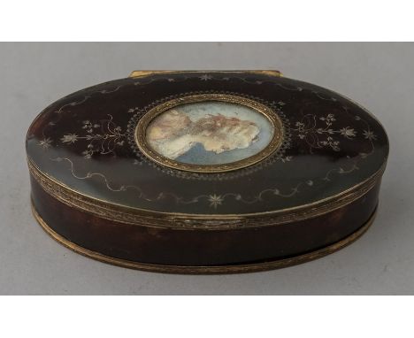 A George III oval tortoiseshell table snuff box, circa 1790, wire pique inlay and oval portrait of a fashionable lady to the 