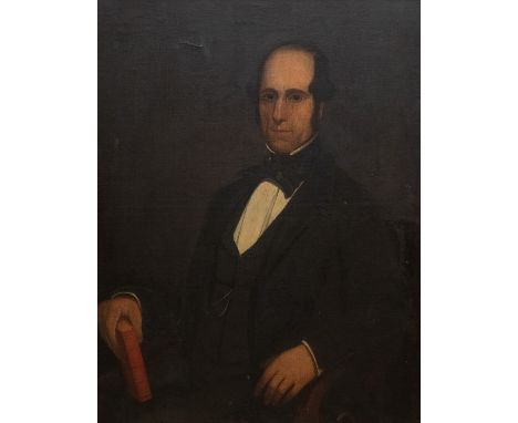British School, circa 1850, portrait of a gentleman, half length seated wearing a black tunic and holding a book, oil on canv