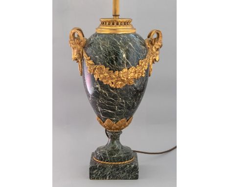 A green veined marble table lamp, 20th Century, of Louis XVI design, cast gilt metal rams mask handles and floral garlands, c