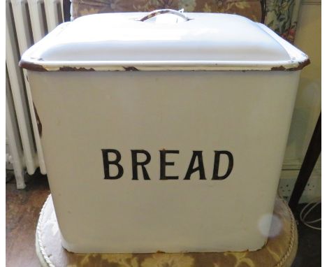 A vintage white enamel bread bin and cover. (1)Condition: Some wear to enamel