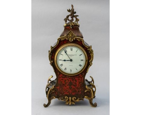 A late 19th Century French boulle work bracket timepiece, circa 1890, of Rococo design, cast gilt metal scroll mounts, 9cm di