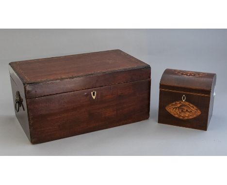 A George III mahogany crossbanded and strung tea caddy, cast metal side handles, fitted interior with a a central mixing bowl