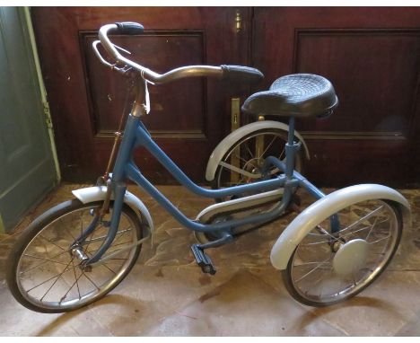 A twentieth century Tri-ang blue-painted, child's tricycle. (1)Condition: In good overall bar some light wear. 