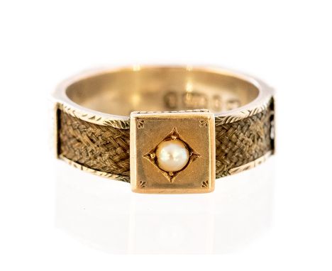A late Victorian 9ct gold mourning ring, set with a single seed pearl and a woven hair shank, Chester 1894 (box)