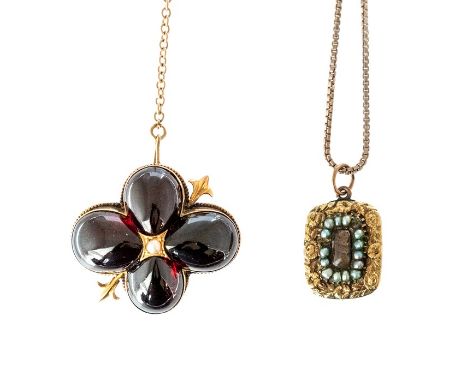 A Victorian yellow metal quatrefoil Brooch set four cabochon garnets and central pearl, with safety chain, 12.7g, Condition r