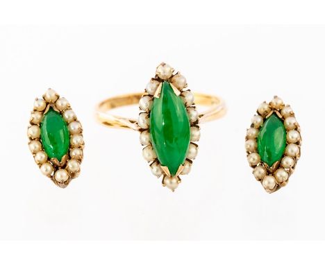 A 14K jade and pearl Ring, claw set marquise shape green jade cabochon to the centre within border of fourteen pearls,  toget