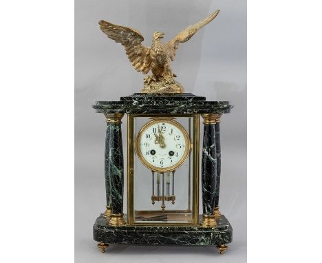 A French green veined marble bracket clock, of Empire Revival design, surmounted by a brass eagle, Arabic dial, mercury pendu