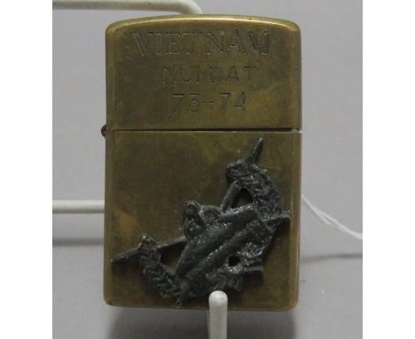 A Zippo lighter with inscription pertaining to the Vietnam war, marked 73 -74 and an inscription to the reverse. (1)Condition