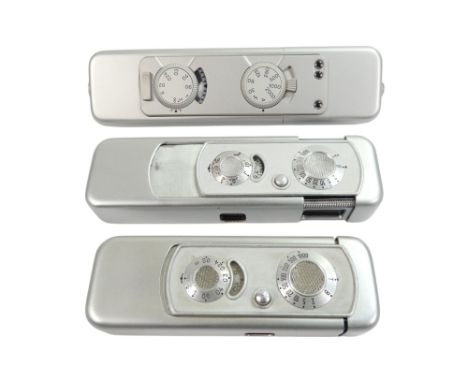 A Minox model A dealer's dummy - circa 1951, together with two other Minox bodies. (3)