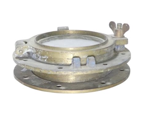 A 20th century brass porthole - including outer flange, 30cm diameter.