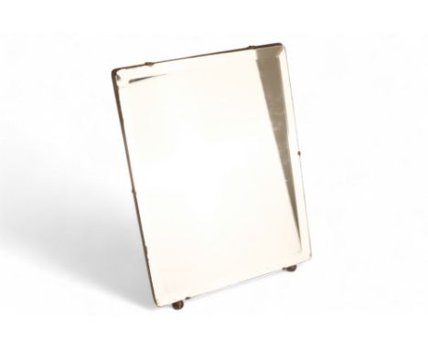 An oak framed easel mirror - the rectangular plate with bevelled edge, height 48cm, width 36cm.