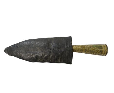 A 19th century Persian Kard - the octagonal brass tapering handle decorated with scrolling foliage, the steel blade with engr