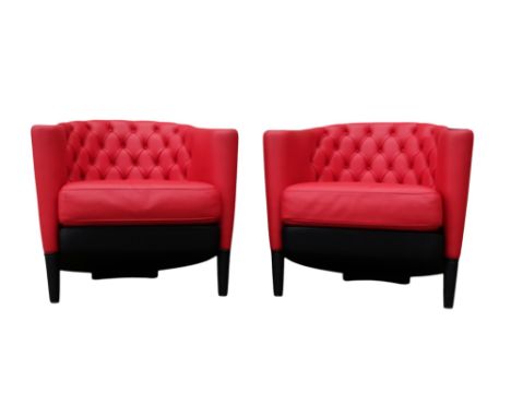 A pair of Moroso leather upholstered tub chairs - button upholstered in red contrasted with black, on short turned legs. (2)