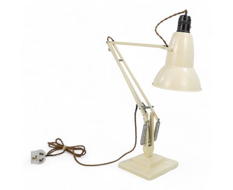 A Herbert Terry Anglepoise lamp - cream painted, the shade with a rolled lip and Crabtree fitting, on a stepped square base.