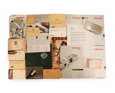 A quantity of Minox ephemera - including two early guide books and two early film sleeves, together with a large quantity of 