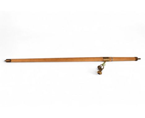 A 19th century Asian sword - the double fullered single edged blade within a later hardwood scabbard and handle with brass fi