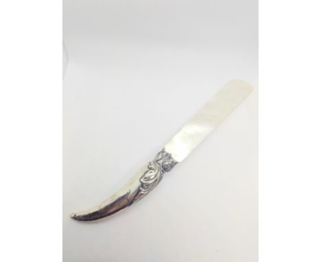 A sterling silver mounted and mother of pearl letter opener. Birmingham 1904. 