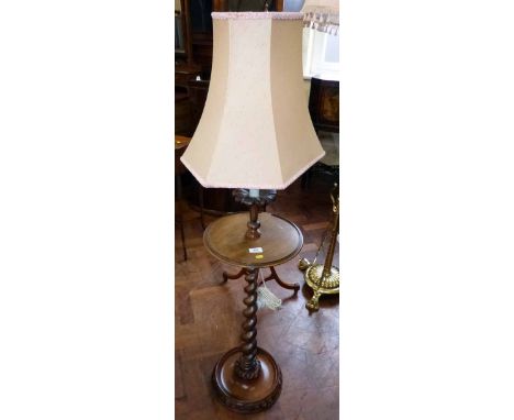 Edwardian mahogany occasional table supporting electric lamp. No condition reports for this sale.