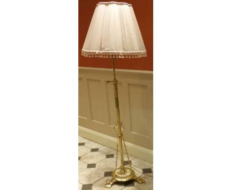 Brass floor standing oil lamp converted to electric. No condition reports for this sale.