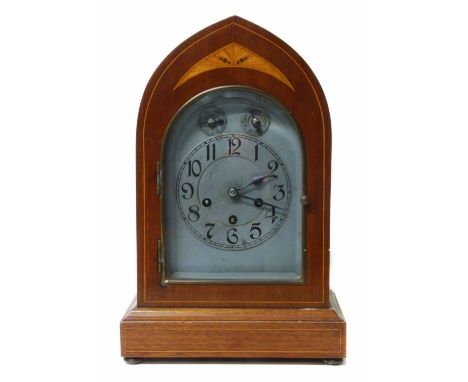 Edwardian mantle clock, lancet mahogany case, three train movement. No condition reports for this sale.