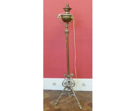 Brass art nouveau adjustable standard lamp with oil lamp No condition reports for this sale.