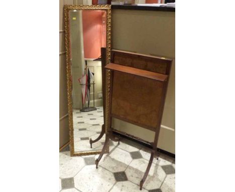Gold painted wall hanging dressing mirror and a mahogany framed fire screen. No condition reports for this sale.