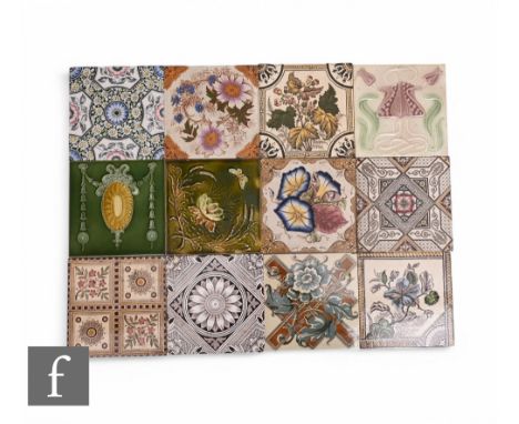 A collection of 19th Century 6 inch dust pressed tiles, transfer printed, moulded and faux tube lined florals, including Wade