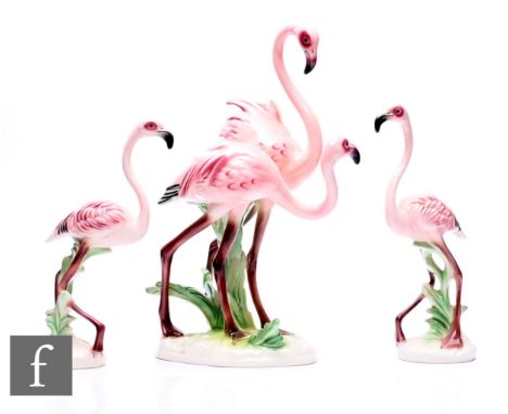 A Goebel figure group modelled as two standing flamingos on naturalistic base, printed marks and impressed no.2338, height 34