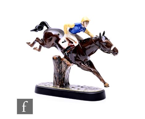 Graham Tongue for Beswick, 'Steeplechaser' no.2505, modelled as a horse and jockey jumping a fence, on integral base, printed
