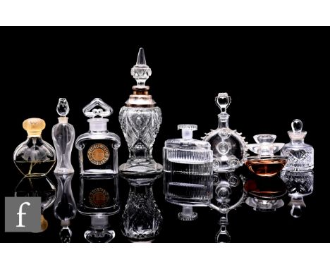 A Baccarat Remy Martin miniature brandy bottle, of circular form with applied crested prunts and rigaree band, together with 