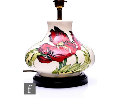 Philip Gibson for Moorcroft Pottery, a Dancing Flame lamp base, of compressed baluster form, tubeline decorated with ragged p