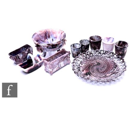 A collection of late Victorian amethyst Malachite pressed glass, including Sowerby basket weave plate, two Sowerby novelty th