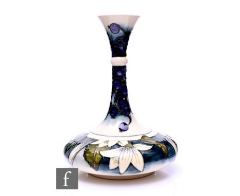 Anji Davenport for Moorcroft Pottery, a Juneberry vase, circa 2000, of compressed spherical form with high drawn knopped neck