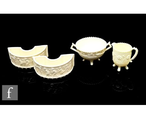 A group of late Victorian Sowerby pressed glass Queen's Ivory items, including pair of semi circular flower troughs in Orange