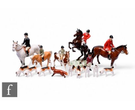 A collection of Beswick hunting figures, including huntsman on chestnut horse modelled by Arthur Greddington, later black sta