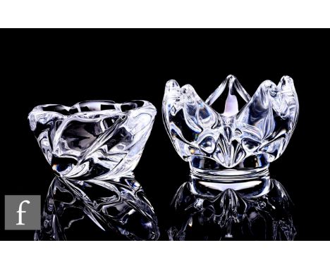 A later 20th Century clear crystal glass Waterfall bowl designed by Edvin Ohrstrom for Orrefors with a wrythen spiral body, e