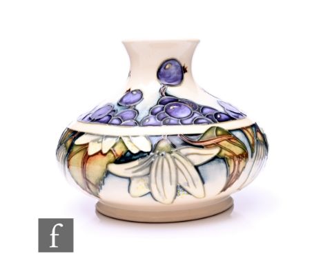 Anji Davenport for Moorcroft Pottery, a June Berry vase, circa 2000, of squat baluster form, tube line decorated with floweri