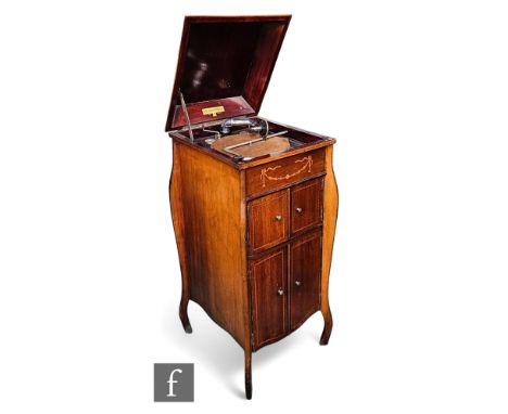 An Edwardian inlaid mahogany floorstanding Fullotone gramophone, enclosed by doors, on slender legs, and a collection of 78rp