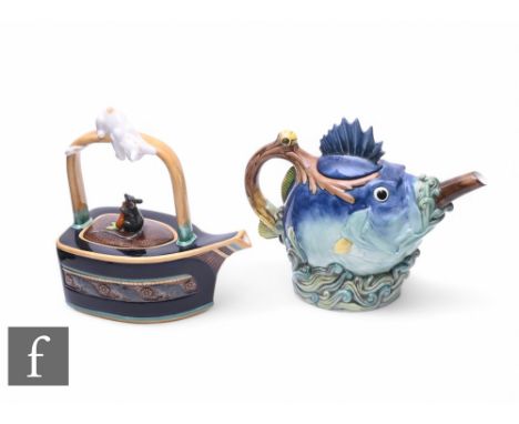 A Minton Archive Collection novelty 'Cat and Mouse' majolica teapot, circa 1995, modelled as flat iron with cat balanced on t