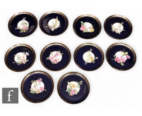 A set of eight William Brownfield late 19th Century porcelain plates, each with raised enamelled botanical studies offset ove