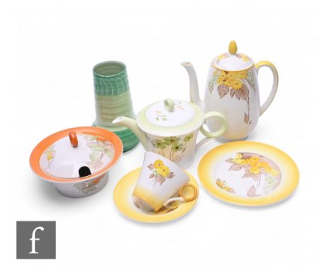 A collection of 1930s Shelley Bone China and pottery to include a Regent shape trio in the yellow Phlox pattern, a coffee pot