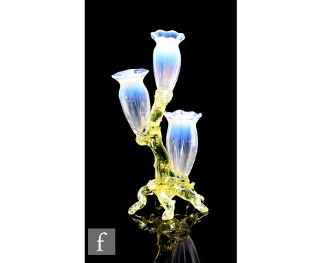 A late 19th Century Stourbridge straw opal and uranium glass posy holder in the style of John Walsh Walsh, modelled as three 