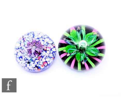 A contemporary William Manson large glass paperweight, of domed form, internally decorated with a large lamp work blue flower