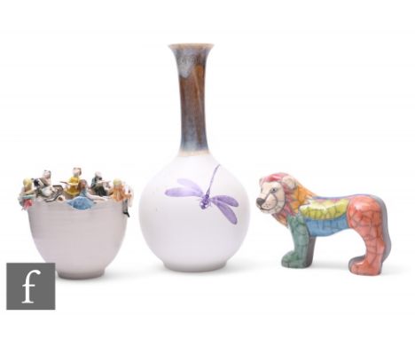 A studio pottery bowl, of footed form, the rim with applied whimsical figures depicting a life drawing class, impressed monog