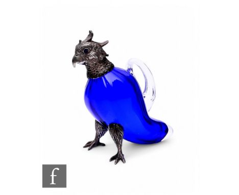 A novelty silver mounted blue glass spirit flask, modelled as a standing parakeet, the silver hinged collar and cover with bl