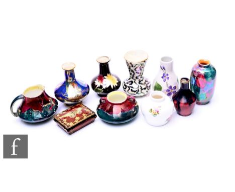 Ten Art Deco miniature vases including a Devon Lustre Fieldings vase of compressed baluster form decorated with galleon and s